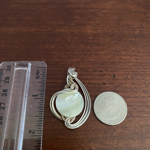 Handmade Mother of Pearl Pendant with Twisted Silver Wire Wrap Design - Picture 5 of 5